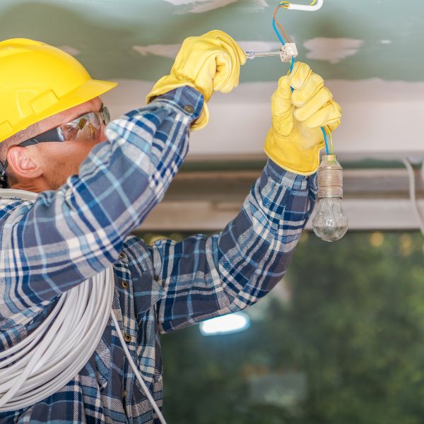 Electrician installing a wire