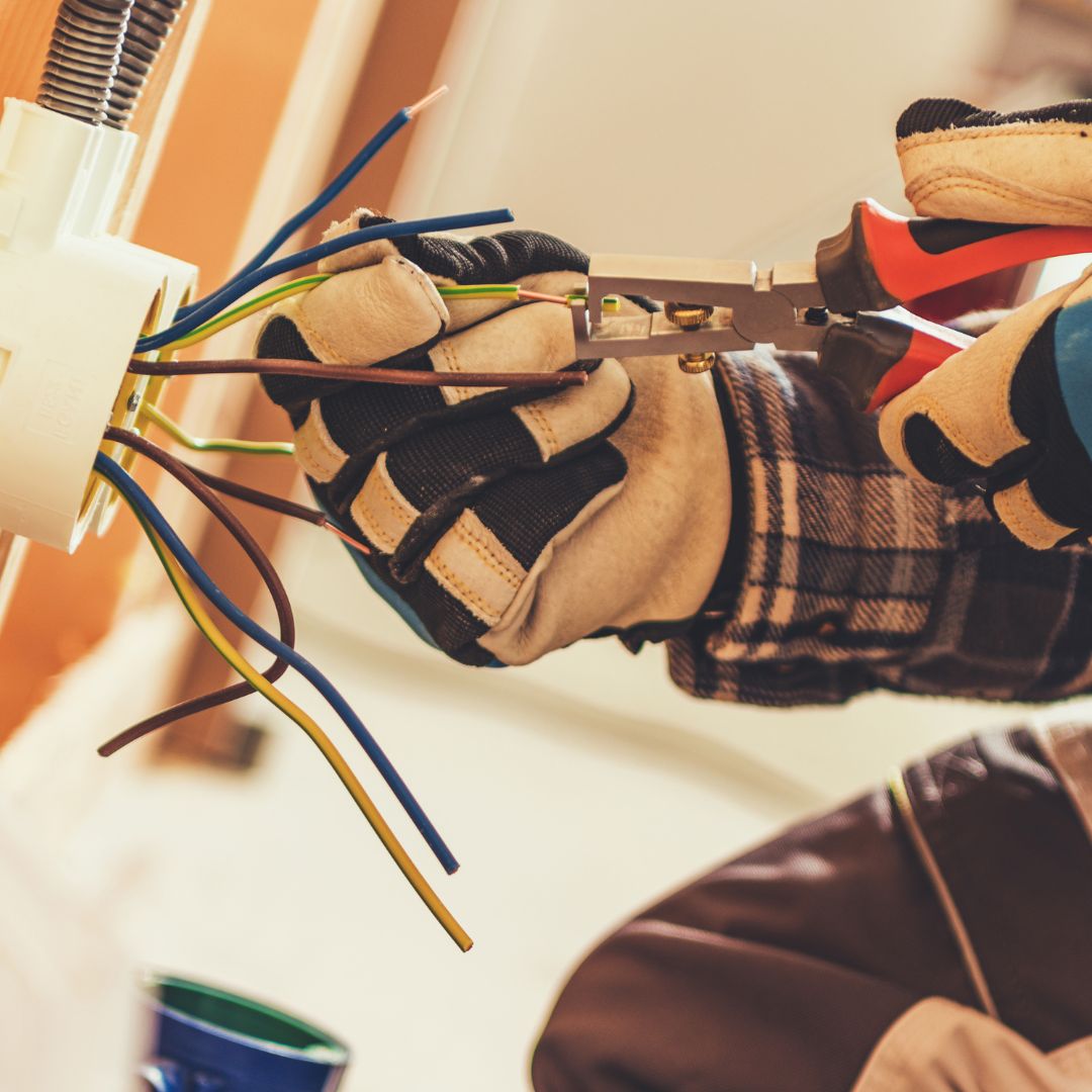 electrician stripping wires