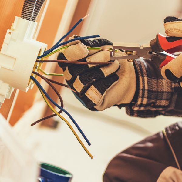 Electrician cutting a wire