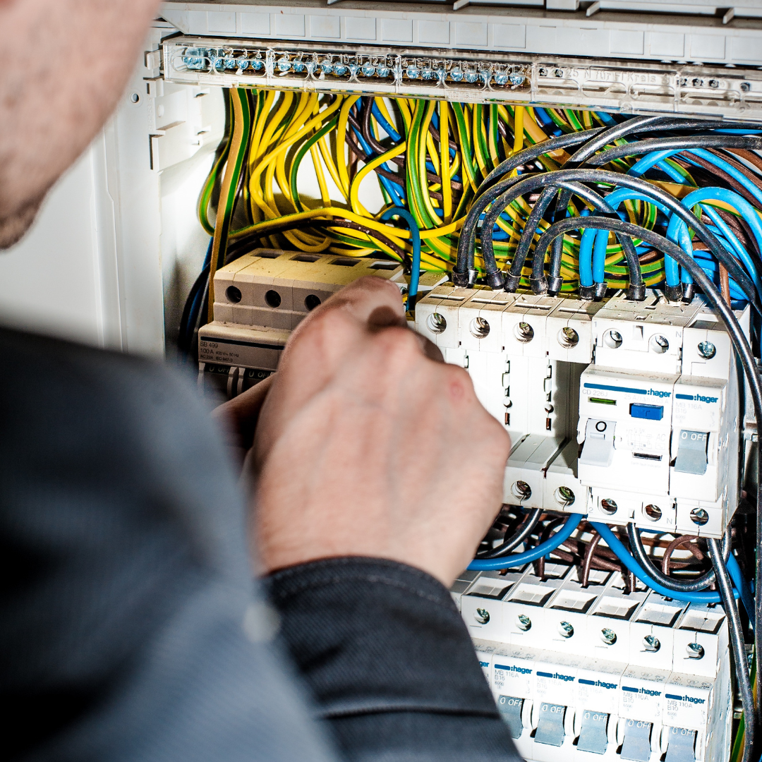 Electrician working with wires