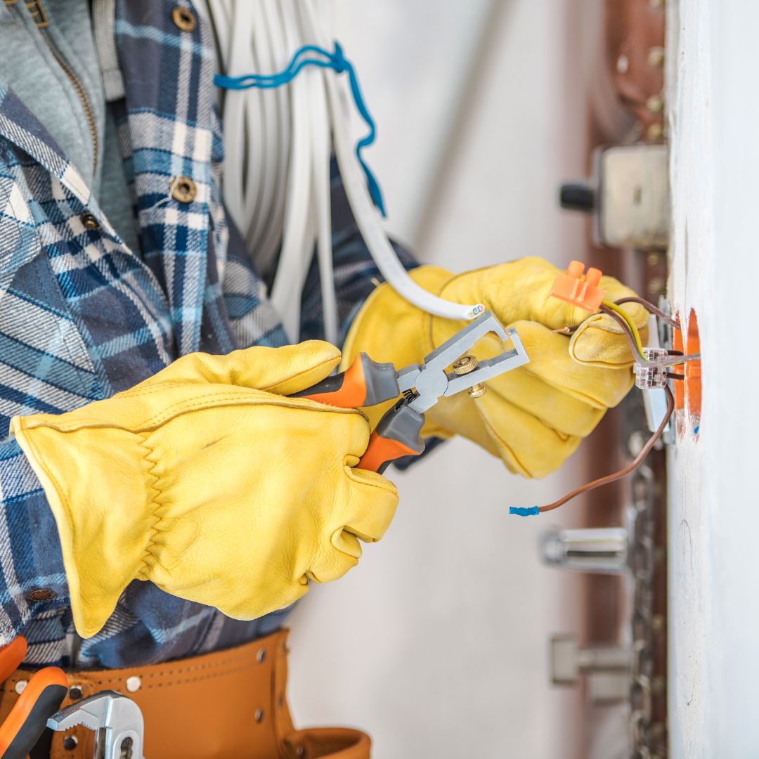 Electrician works on wiring