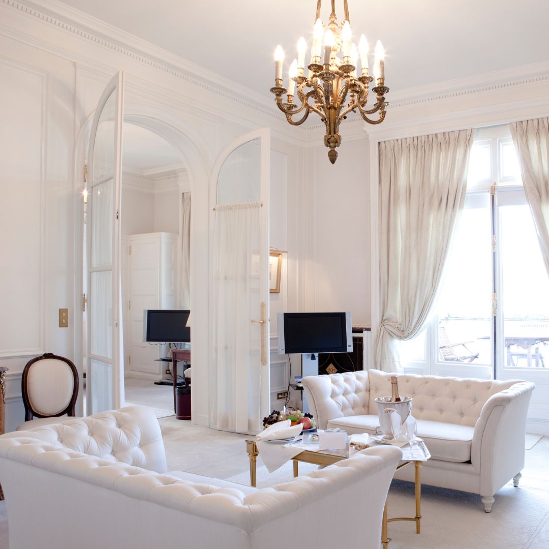 an antique chandelier in a living room